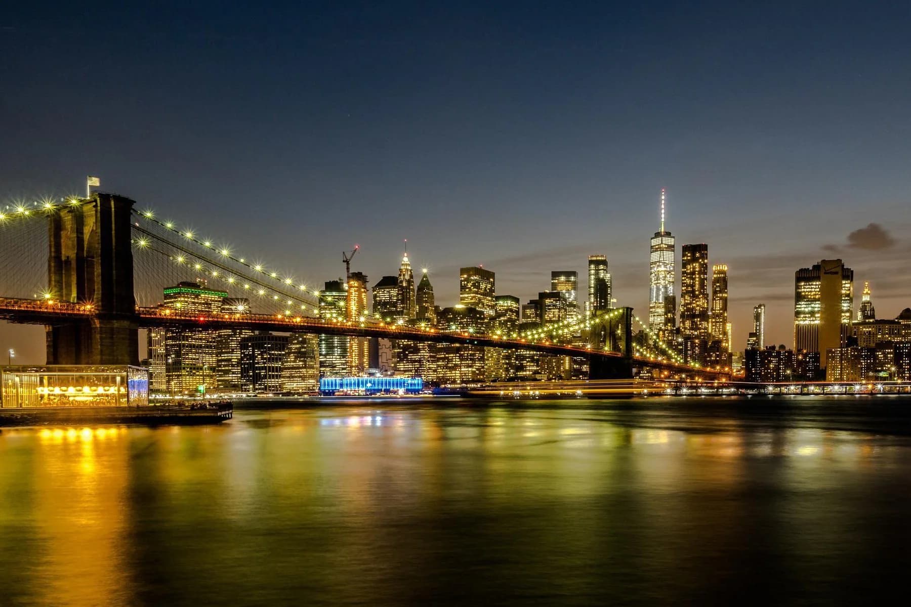 Sunset skyline cruise near Statue of Liberty