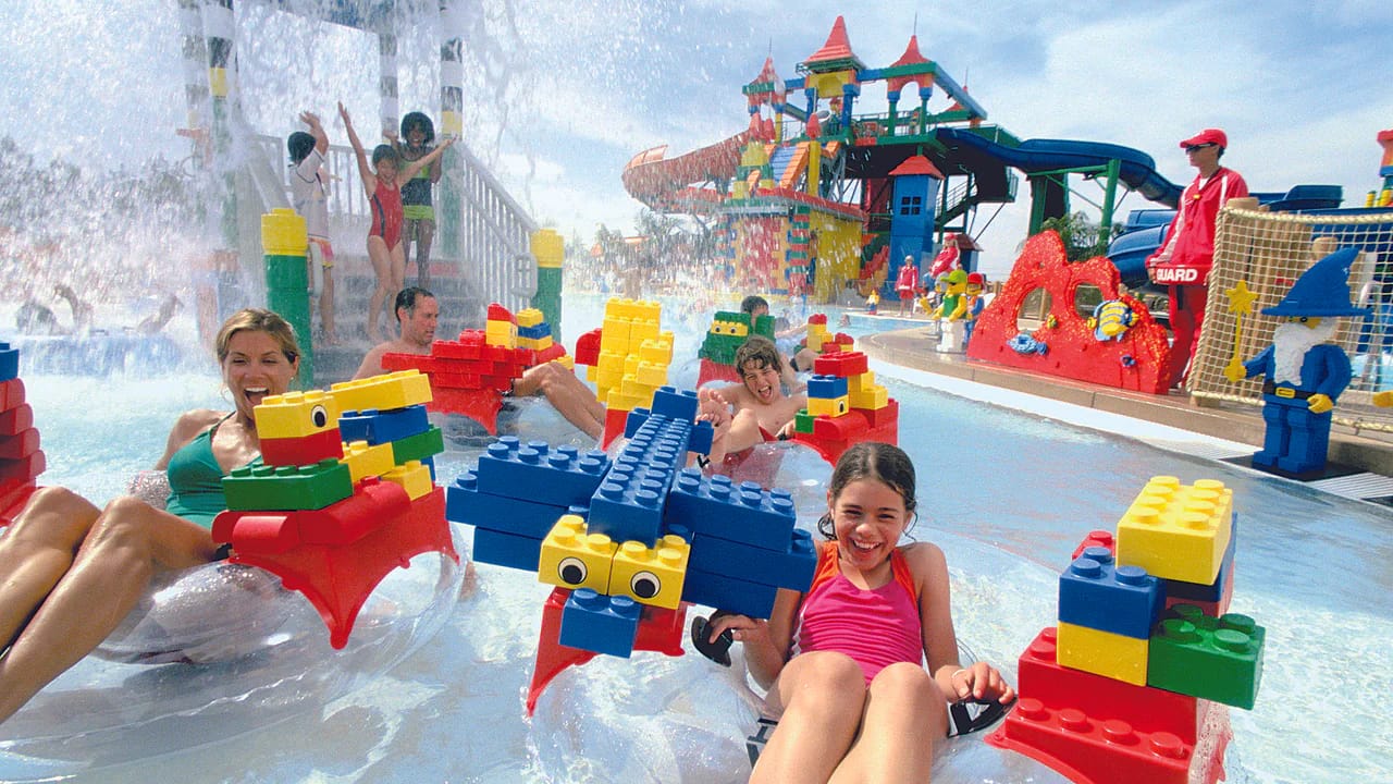 family enjoying LEGOLAND Water Park lazy river in Dubai