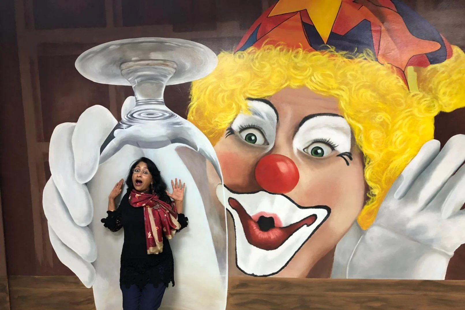 Woman captivated by 3D art at Dubai museum