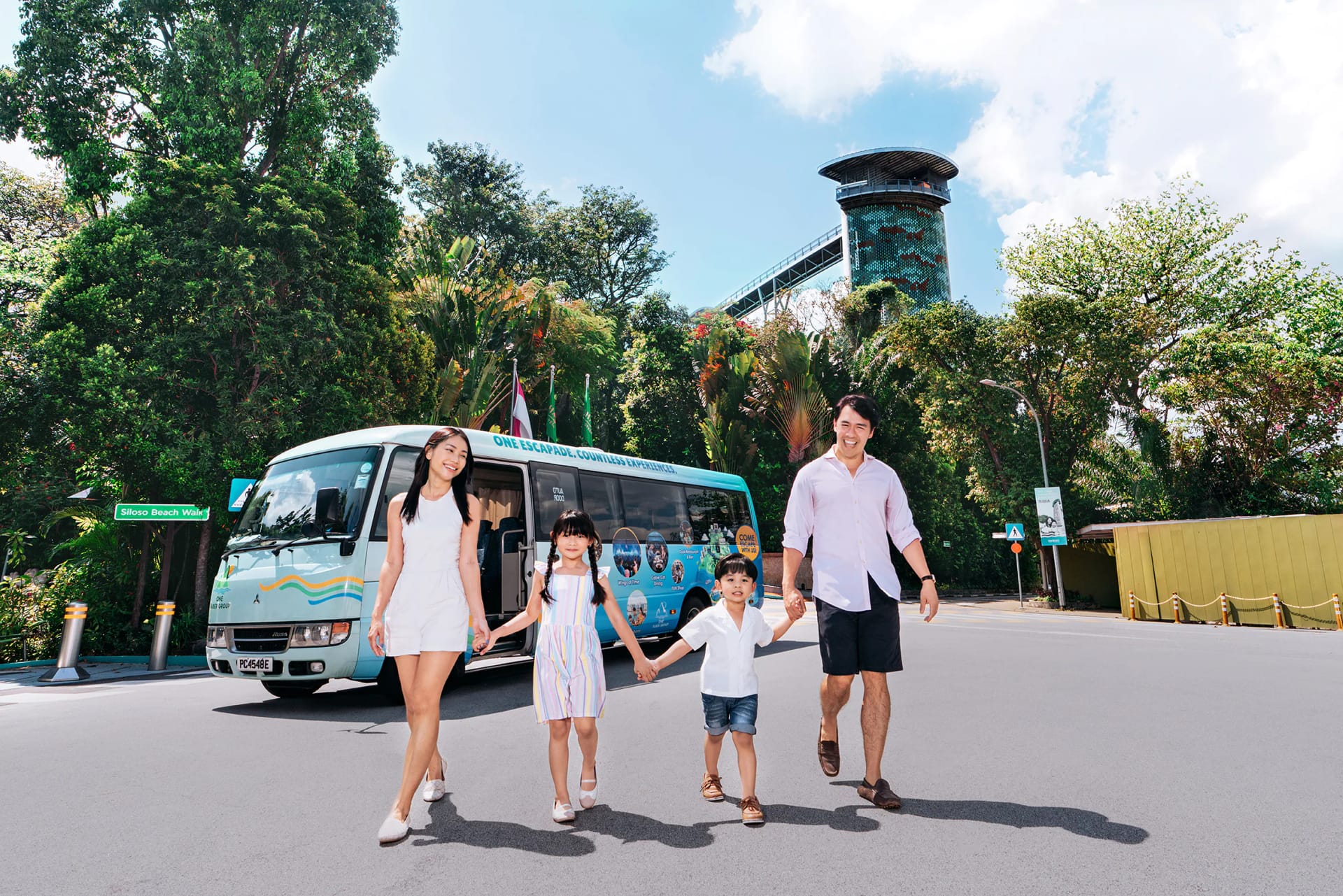 family enjoying Sentosa Island Bus Tour in Singapore