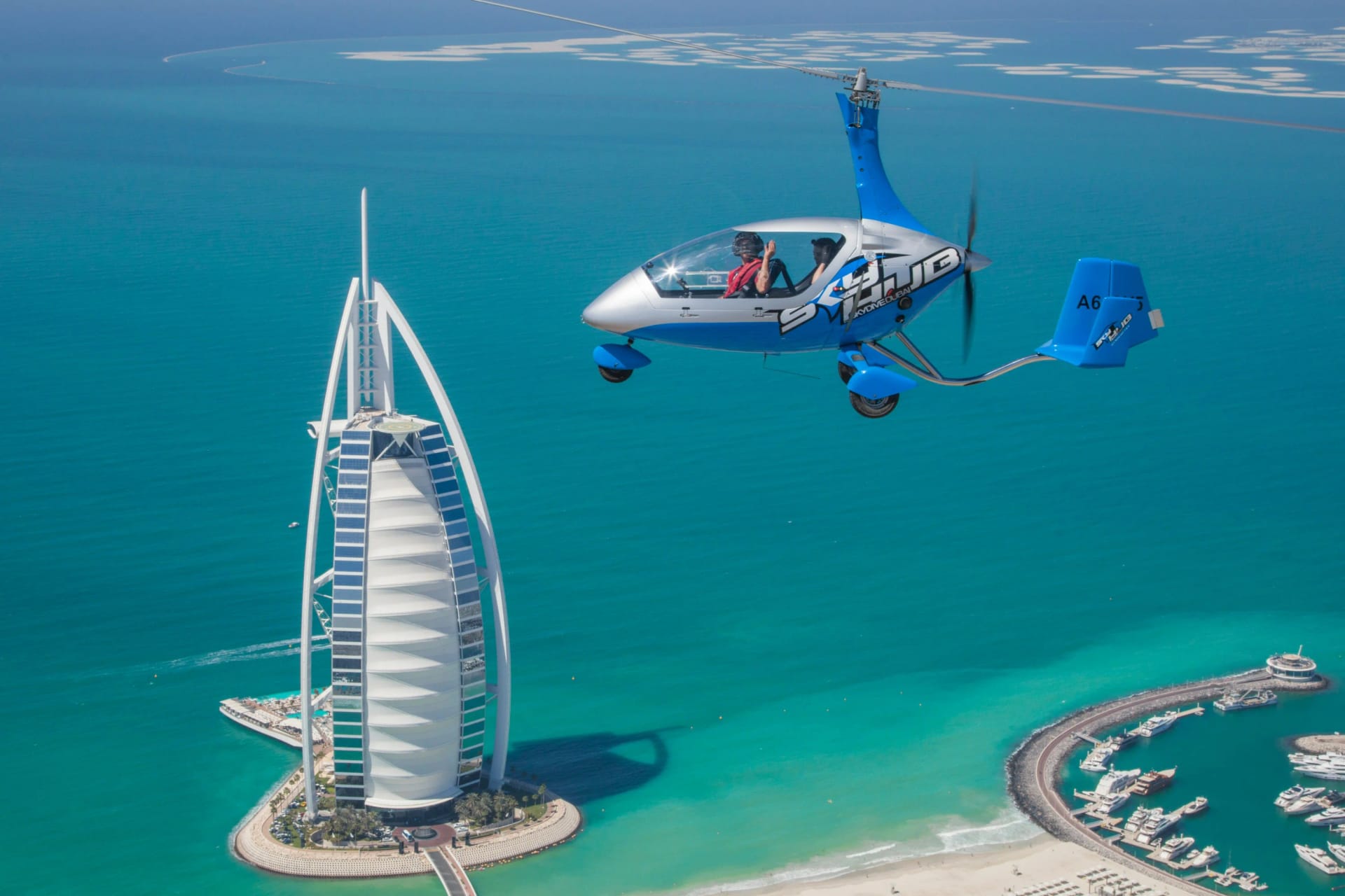 Gyrocopter flight over Dubai skyline