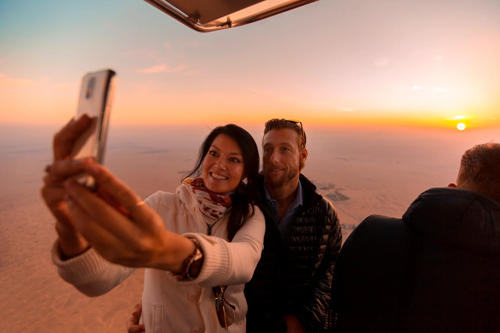 couple enjoying hot air balloon flight in Dubai