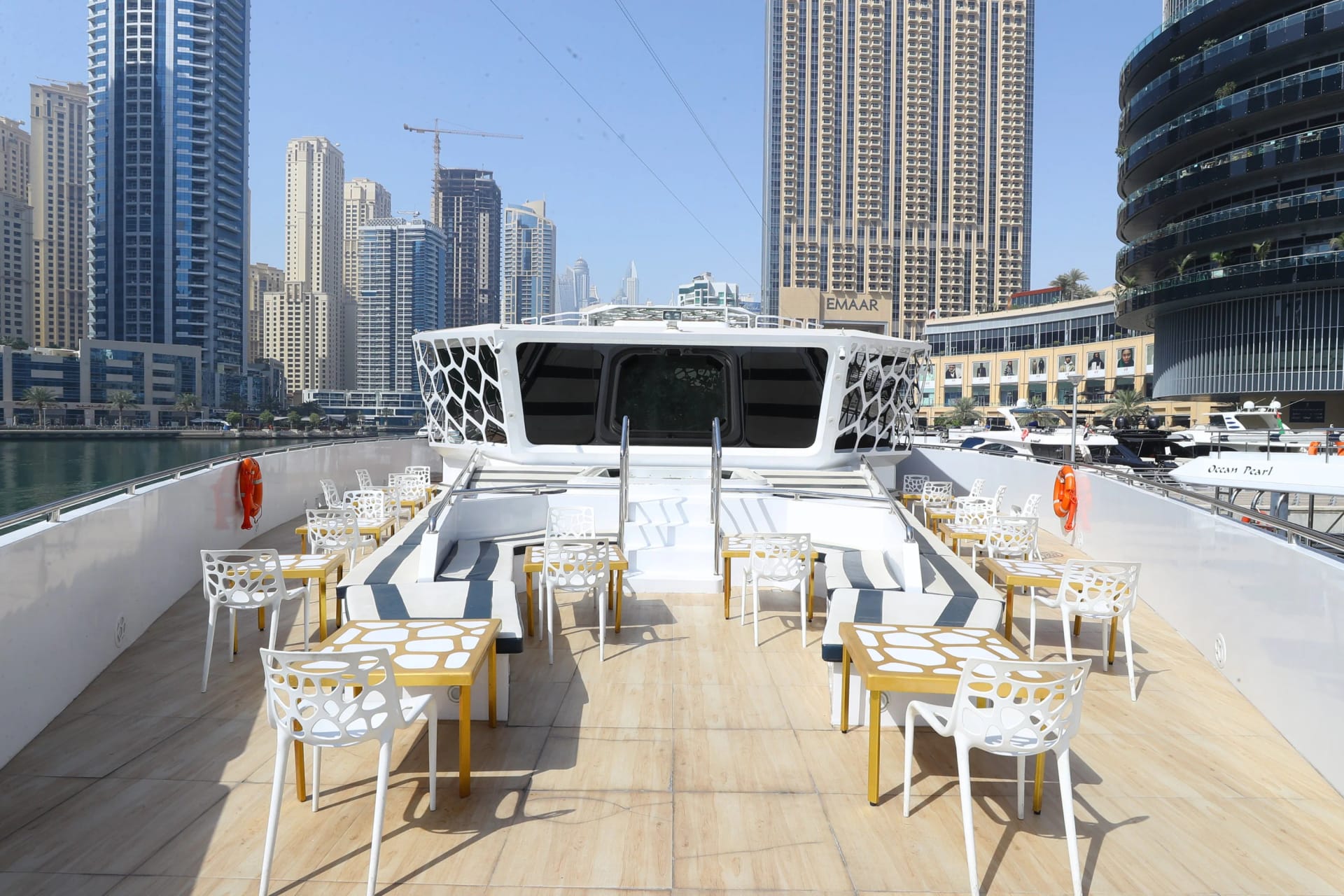 Luxurious dining area aboard Mega Yacht in Dubai