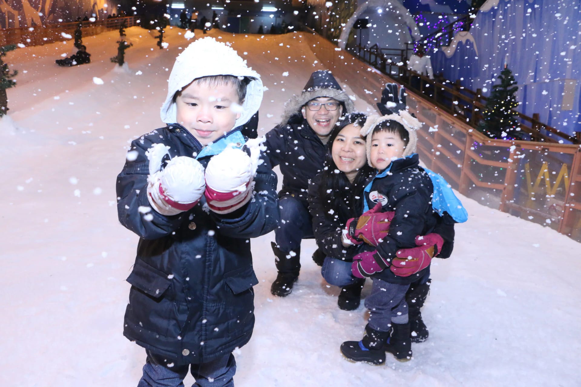 Visitors enjoying winter fun at Snow City Singapore