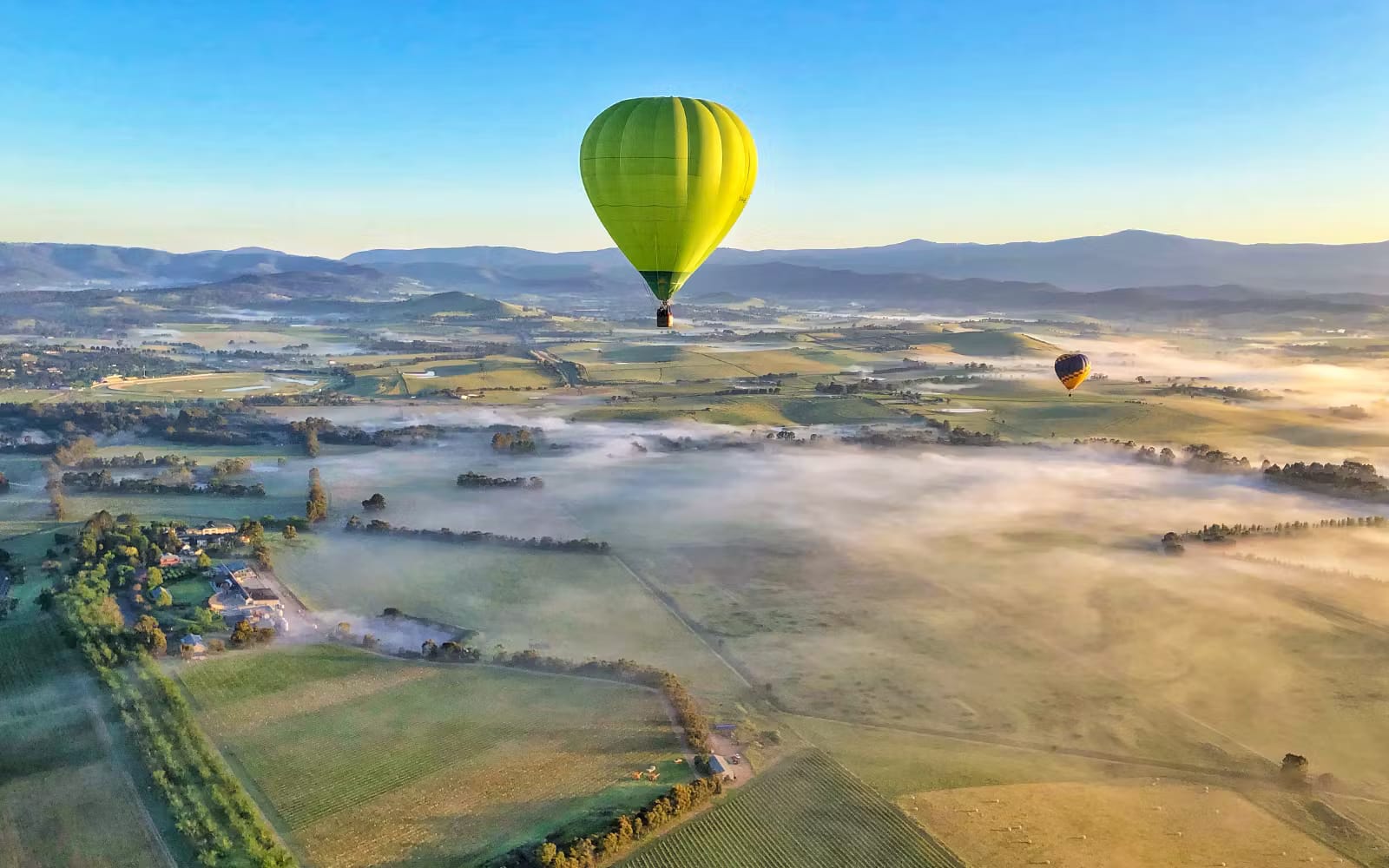 6fc1aee4682921de98d803793f76a8df-SunriseHotAirBalloonFlightOvertheYarraValley3.avif
