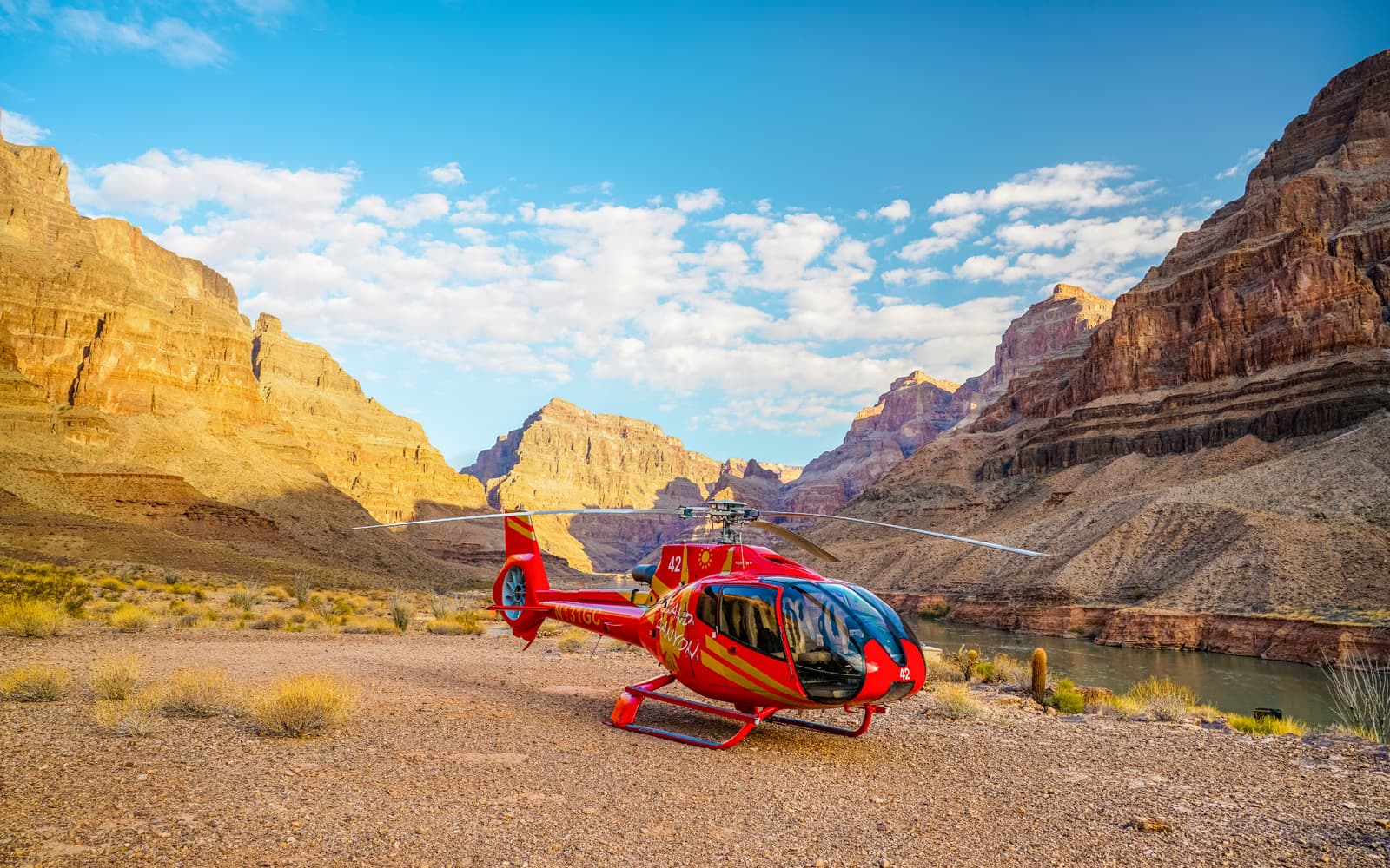 From Las Vegas: 70+ min Grand Canyon West Rim Helicopter Tour plus Canyon Floor Landing with Champagne