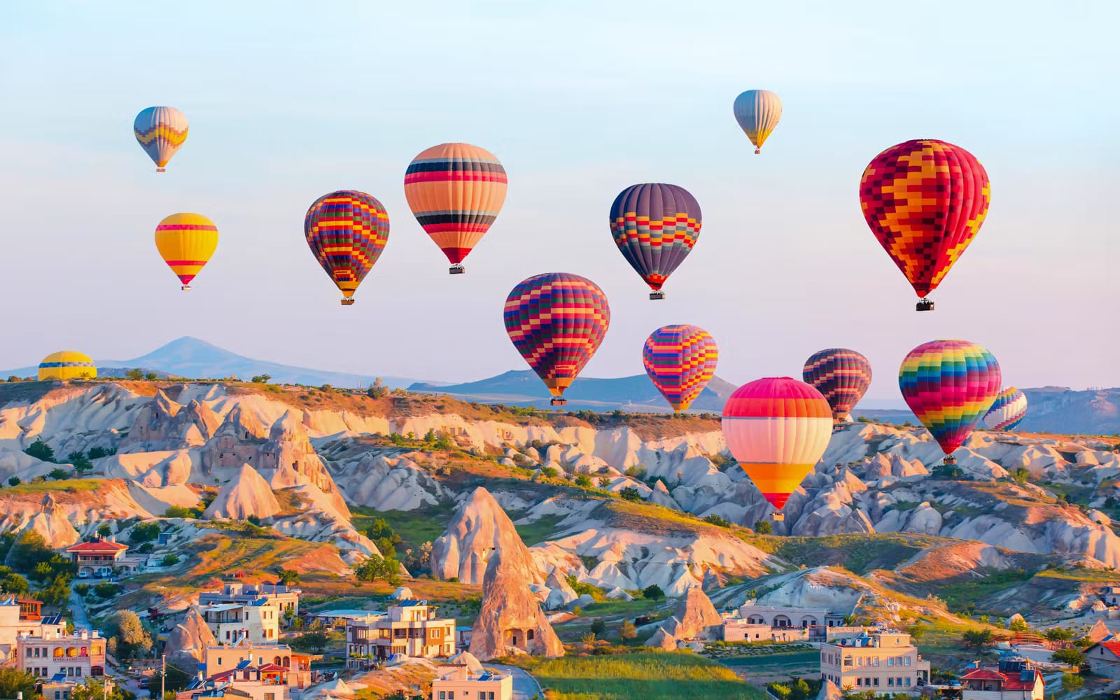 40e65a8e75c76bb30f104d39f5279869-17762-cappadocia-cappadocia-goreme-sunrise-hot-air-balloon-tour-with-breakfast---transfer-001.avif