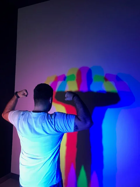 Visitor enjoying illusions at Museum of Illusions Dubai