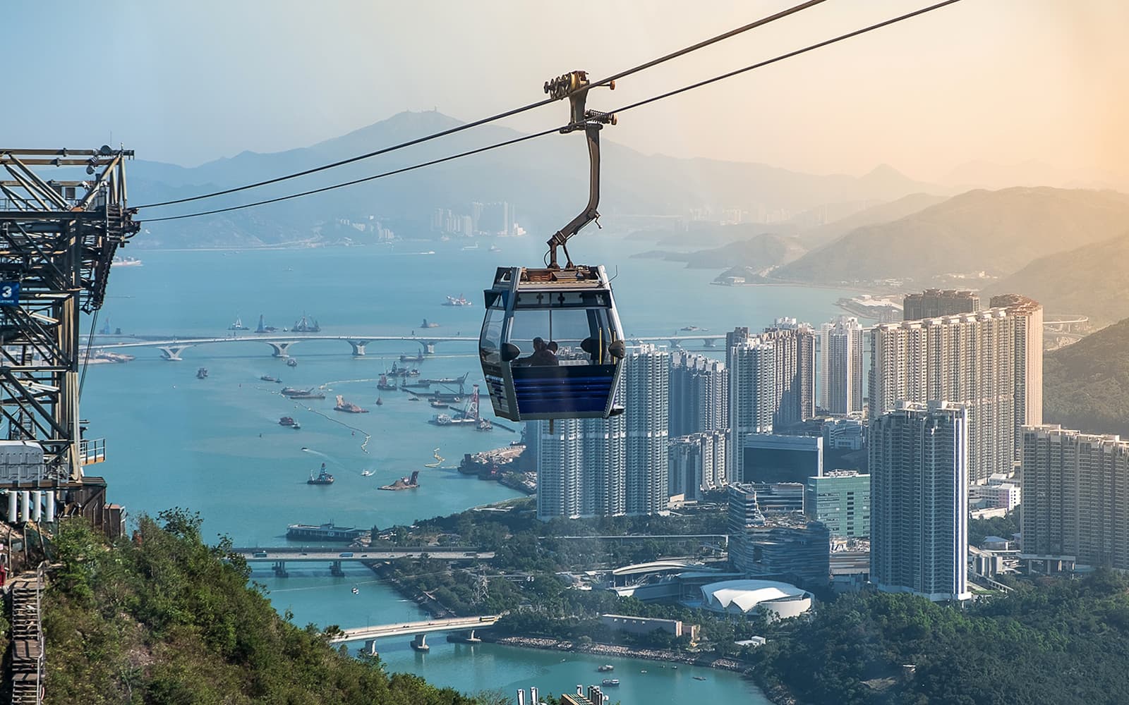 Combo: Ngong Ping Two-Way Cable Car + Hong Kong Airport Train Transfer Tickets experience in Hong Kong | TickYourList