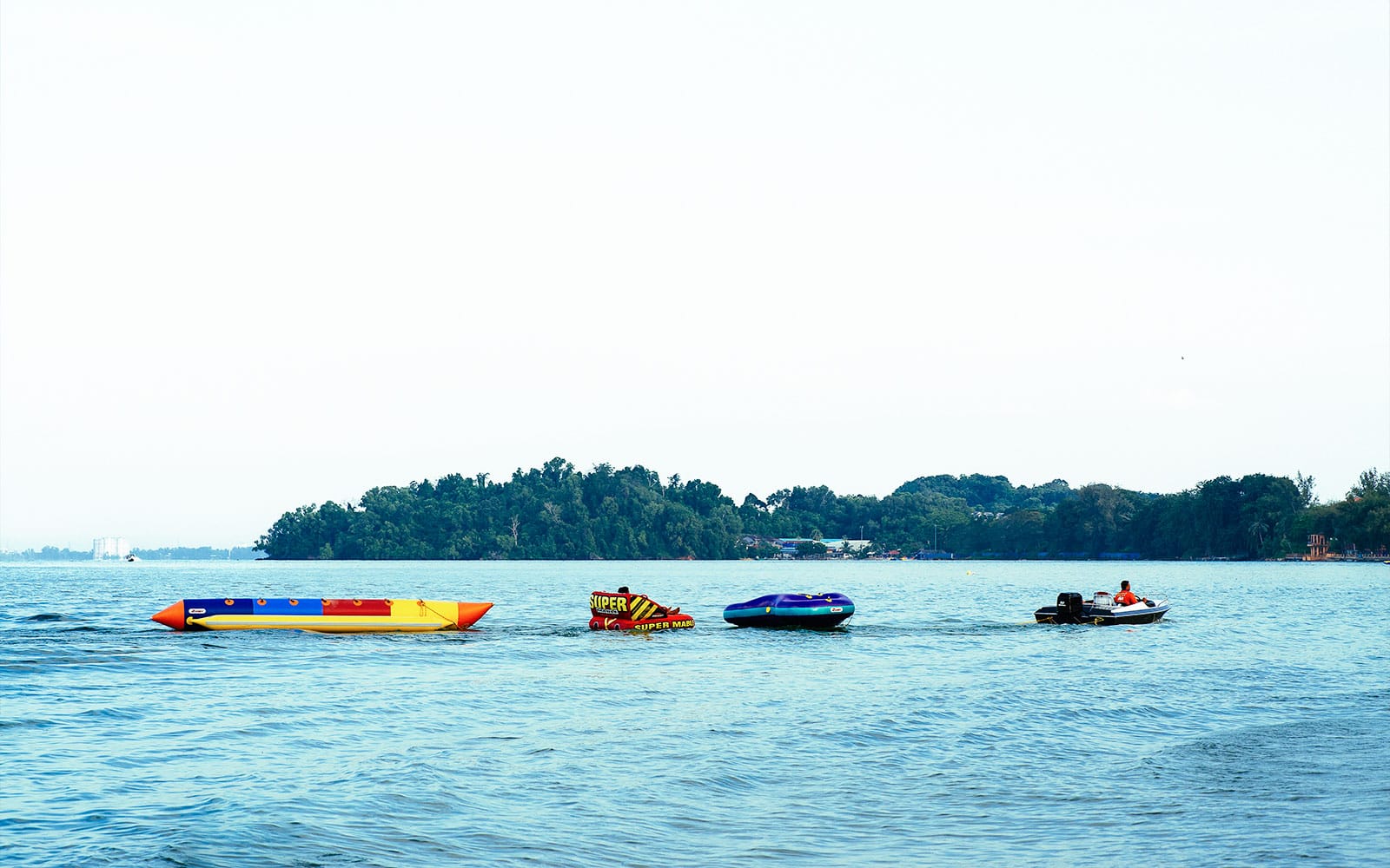 Shared Sunset Cruise & Banana Boat Ride or Kayaking at Paradise 101 tickets in Langkawi - Attractions | TickYourList