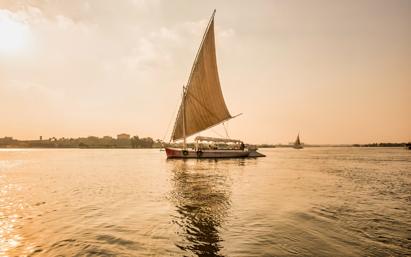 From Cairo: Half-Day Giza Pyramids & Sphinx Guided Tour with Nile Felucca Ride & Hotel Transfers