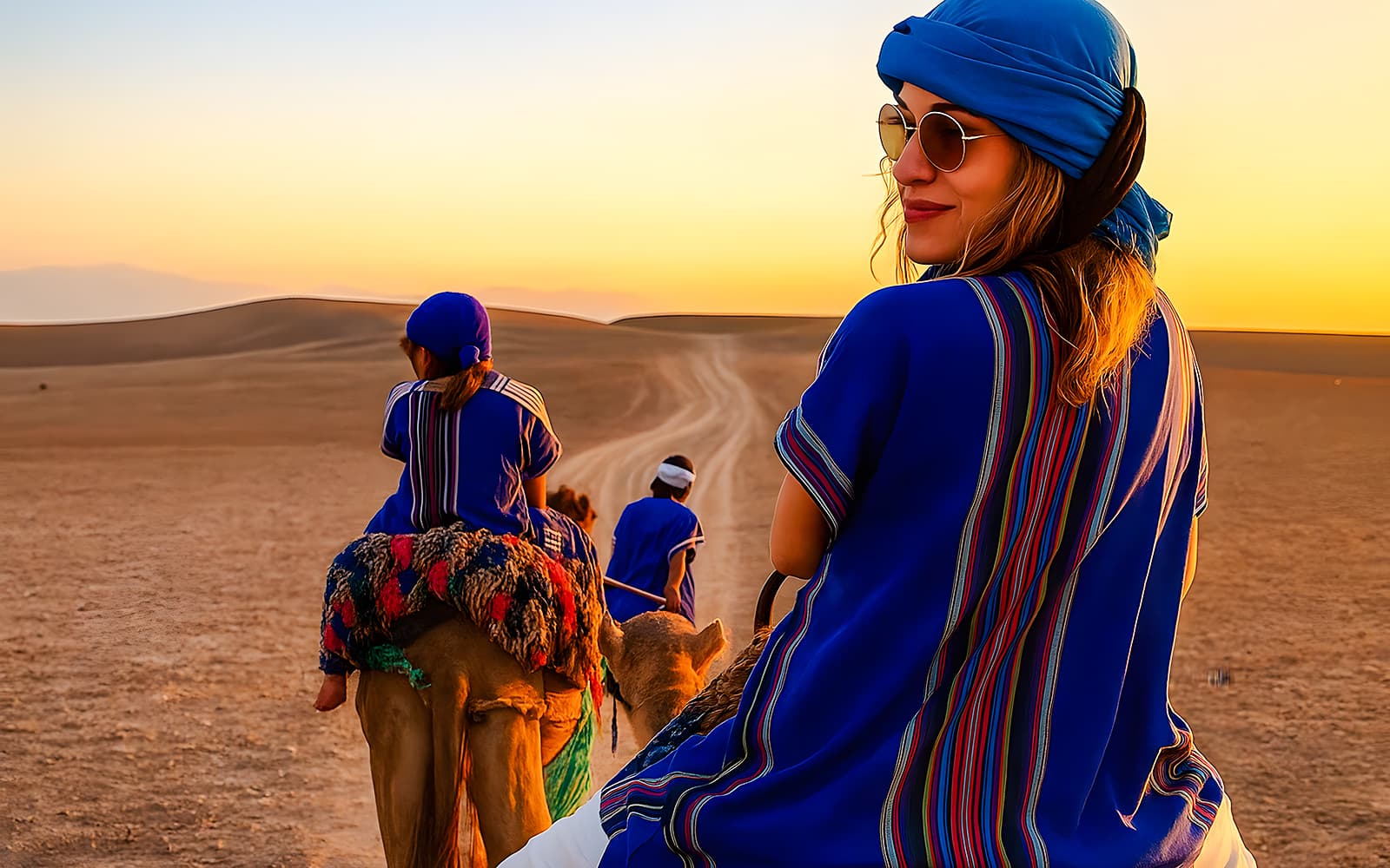 Sunset Desert Safari with Quad Bike, Camel Ride, Dinner Show & Transfers