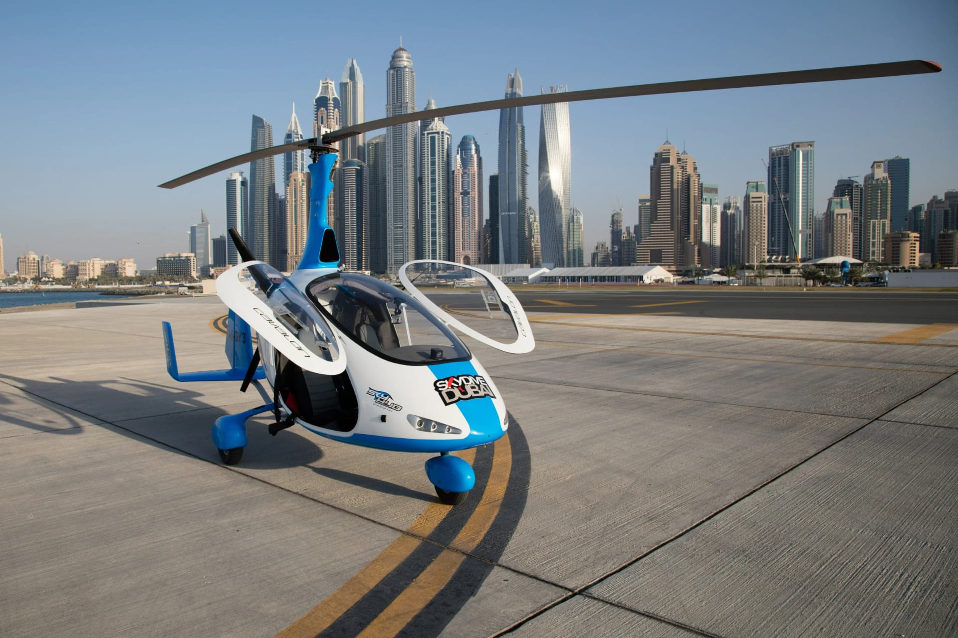 Gyrocopter flight over Dubai skyline
