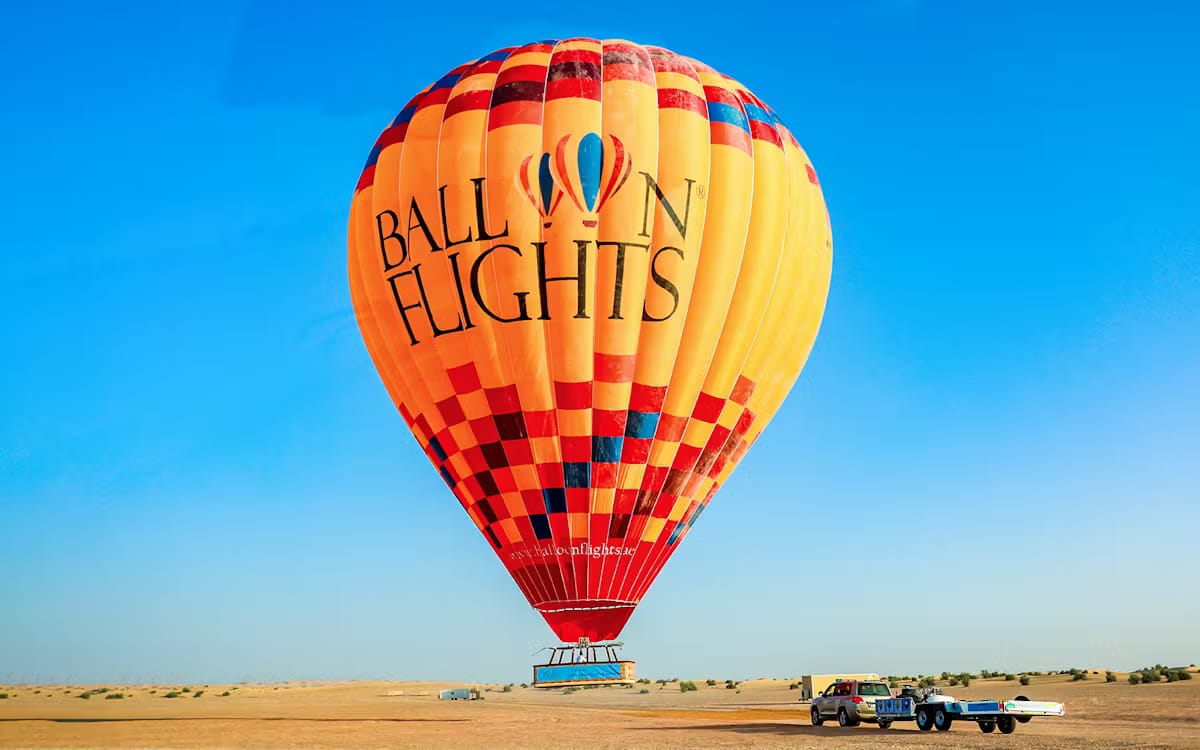 339b8e37cf0a999ed366b32655cff536-21022--dubai---sunrise-hot-air-balloon-experience-with-falcon-photography---camel-ride-08.avif