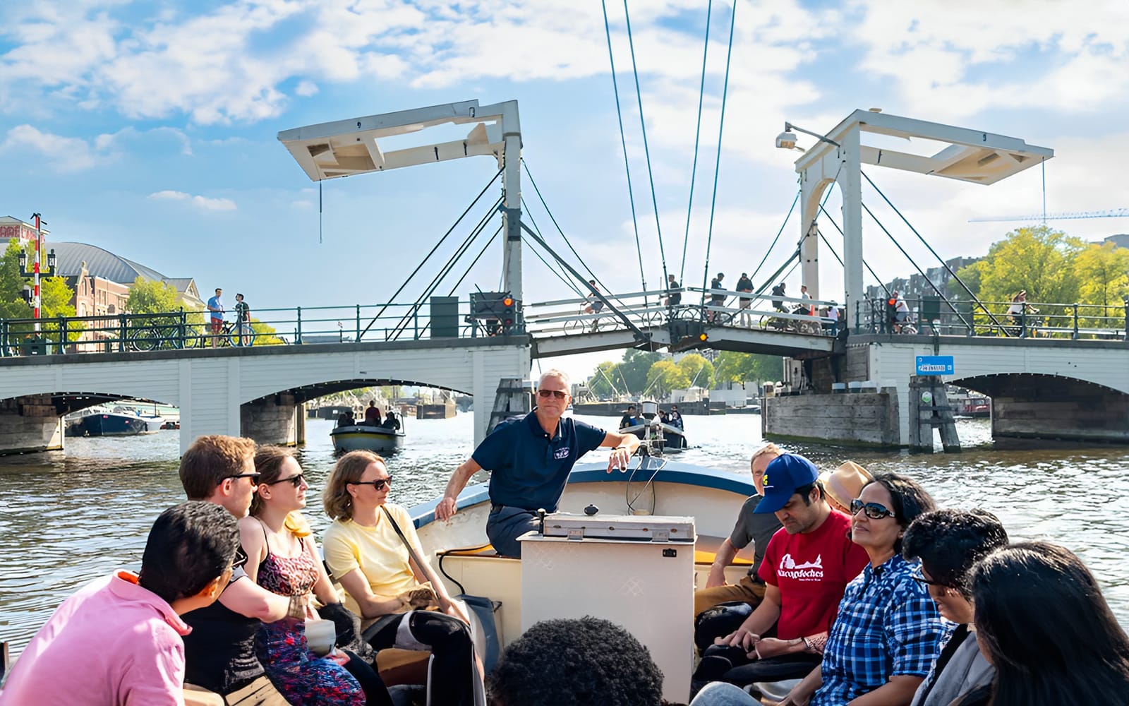 Amsterdam: 75-Minute Small Open Boat Canal Cruise tickets in Amsterdam - Attractions | TickYourList