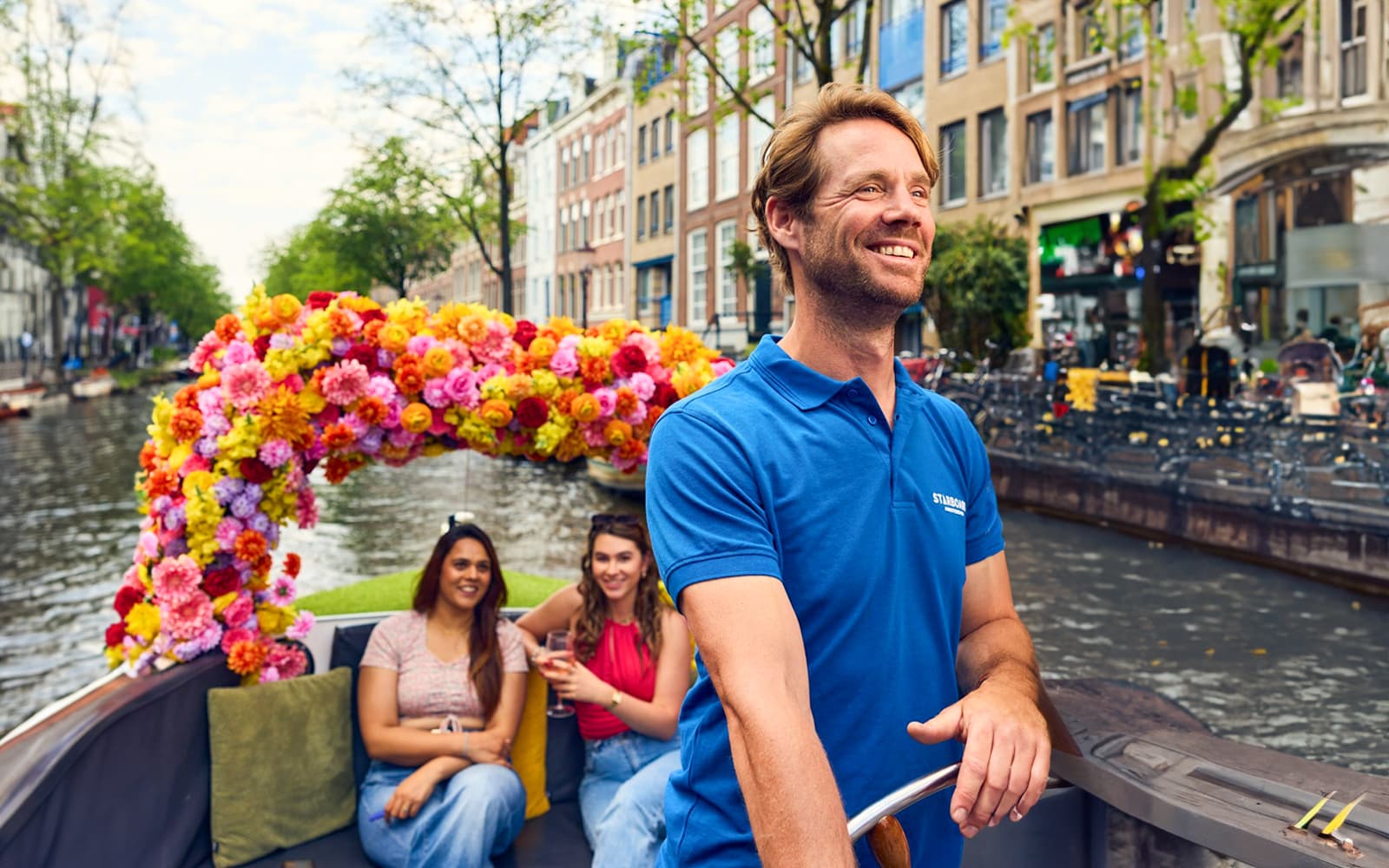 Amsterdam: Exclusive Flower or Tulip Experience on a Luxury Open Boat tickets in Amsterdam - Features | TickYourList