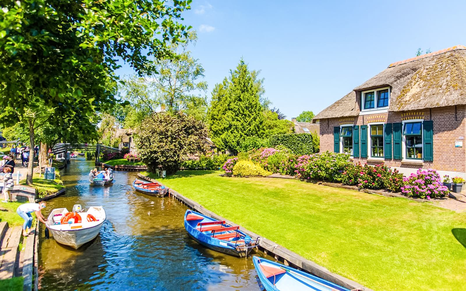 From Amsterdam: Giethoorn Day Trip with Boat Tour & Afsluitdijk Visit tickets in Amsterdam - Attractions | TickYourList