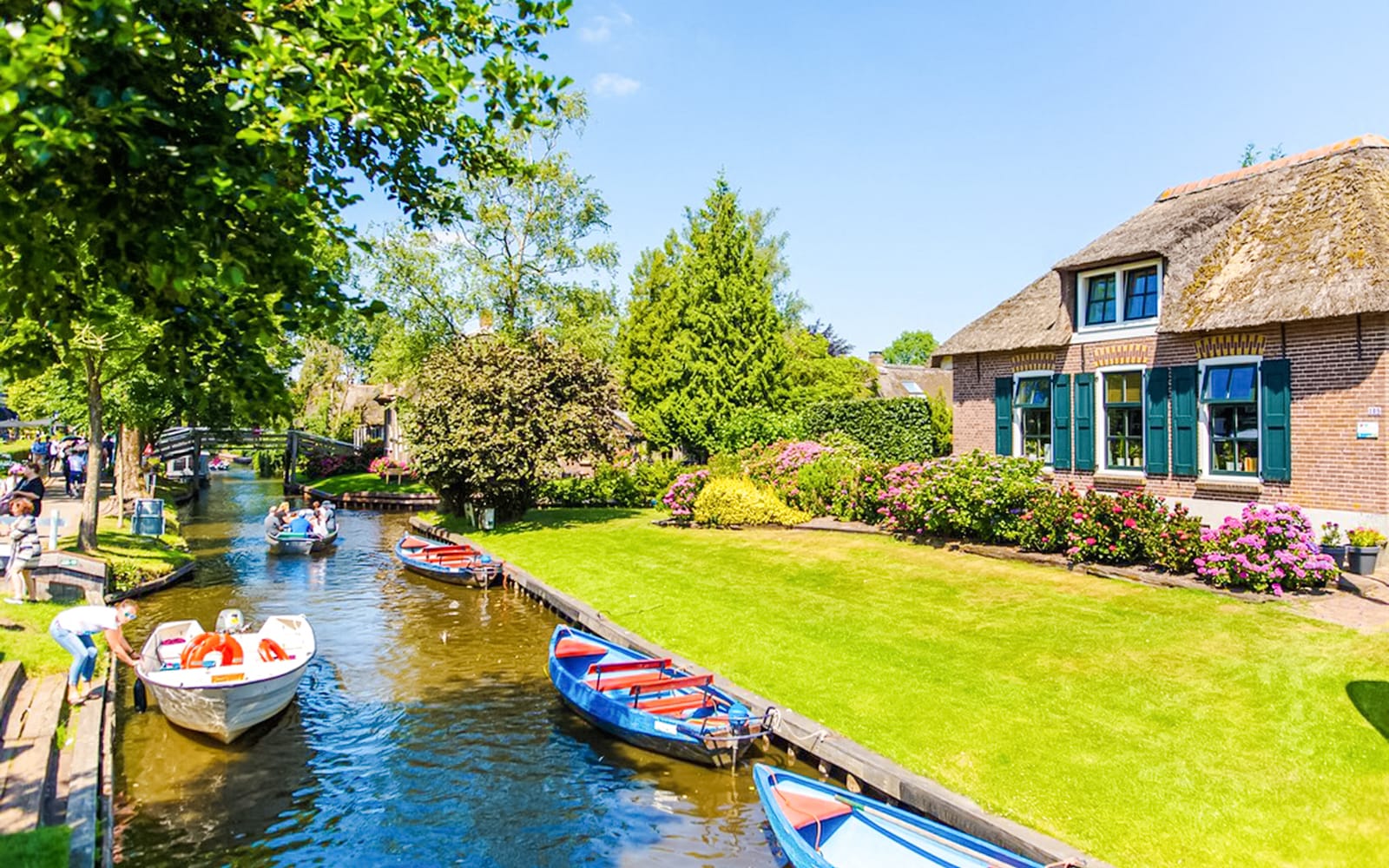 From Amsterdam: Giethoorn Day Trip with Boat Tour & Afsluitdijk Visit tickets in Amsterdam - Attractions | TickYourList