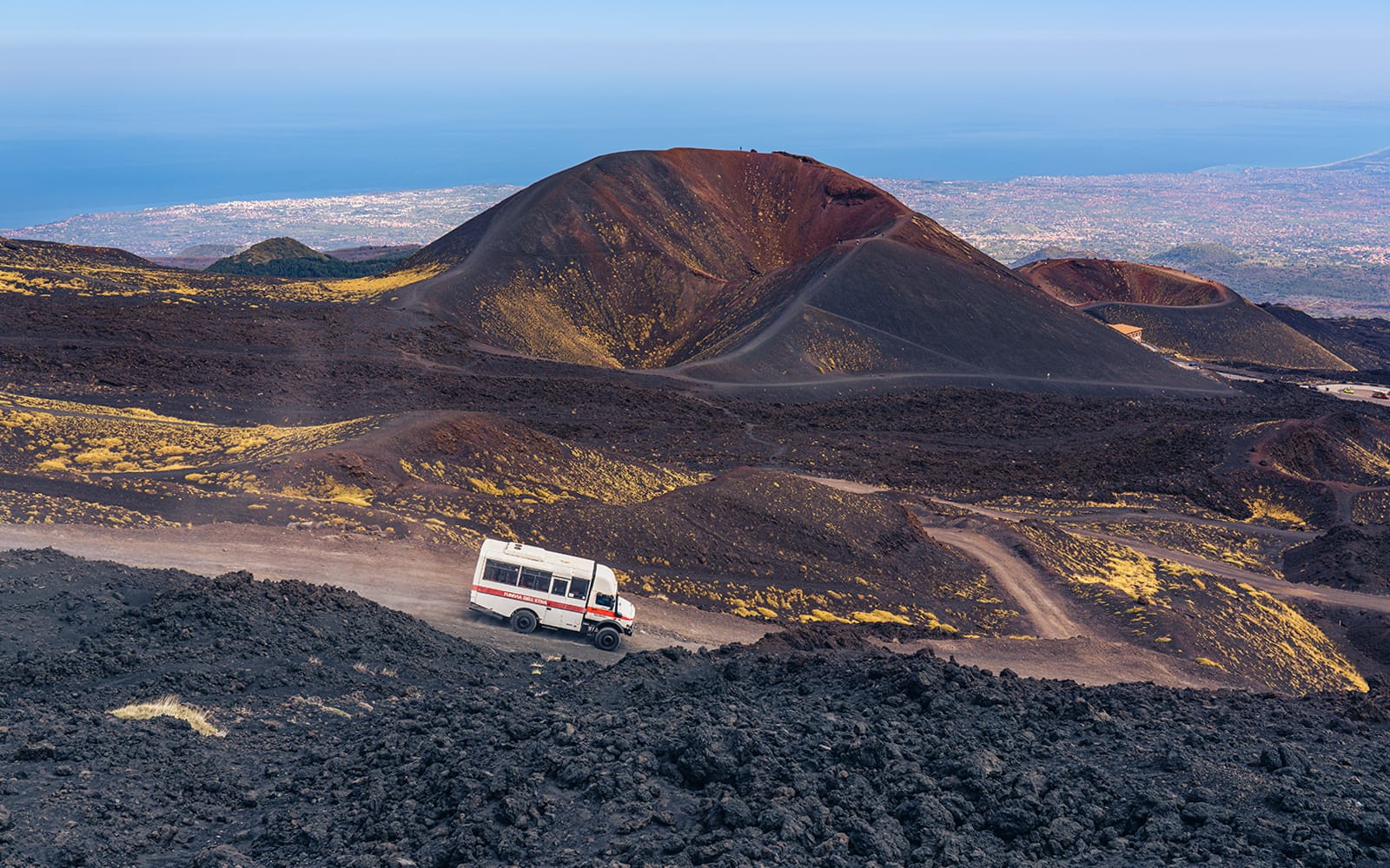 From Catania: Mount Etna Summit Craters Hiking Tour with Round-Trip Transfers tickets in Catania - Highlights | TickYourList