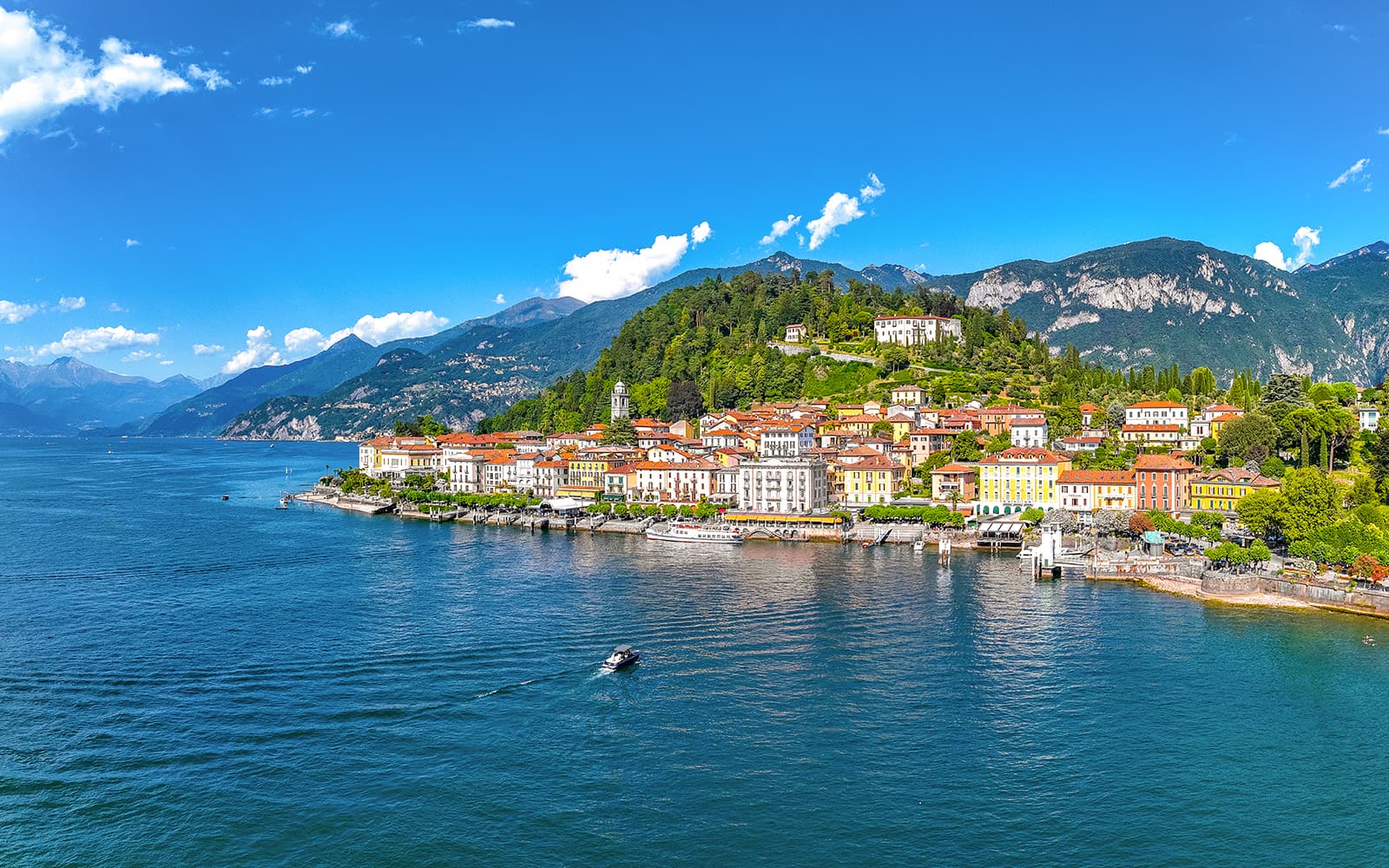From Milan: Lake Como, Bellagio & Lugano by Bus with Private Boat Tour
