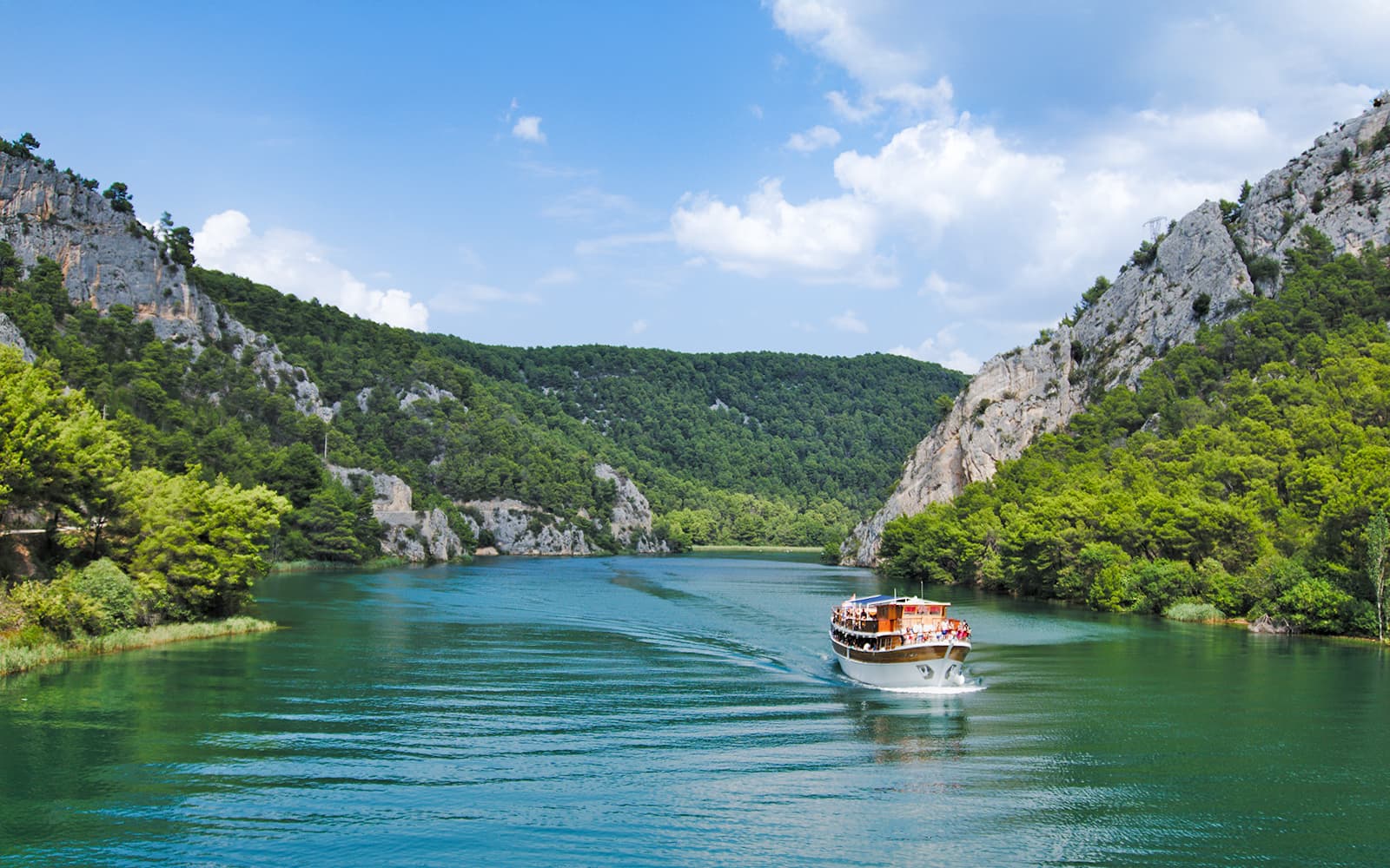 From Split: Full-Day Guided Trip to Krka National Park with Boat Ride & Wine Tasting tickets in Split - Highlights | TickYourList