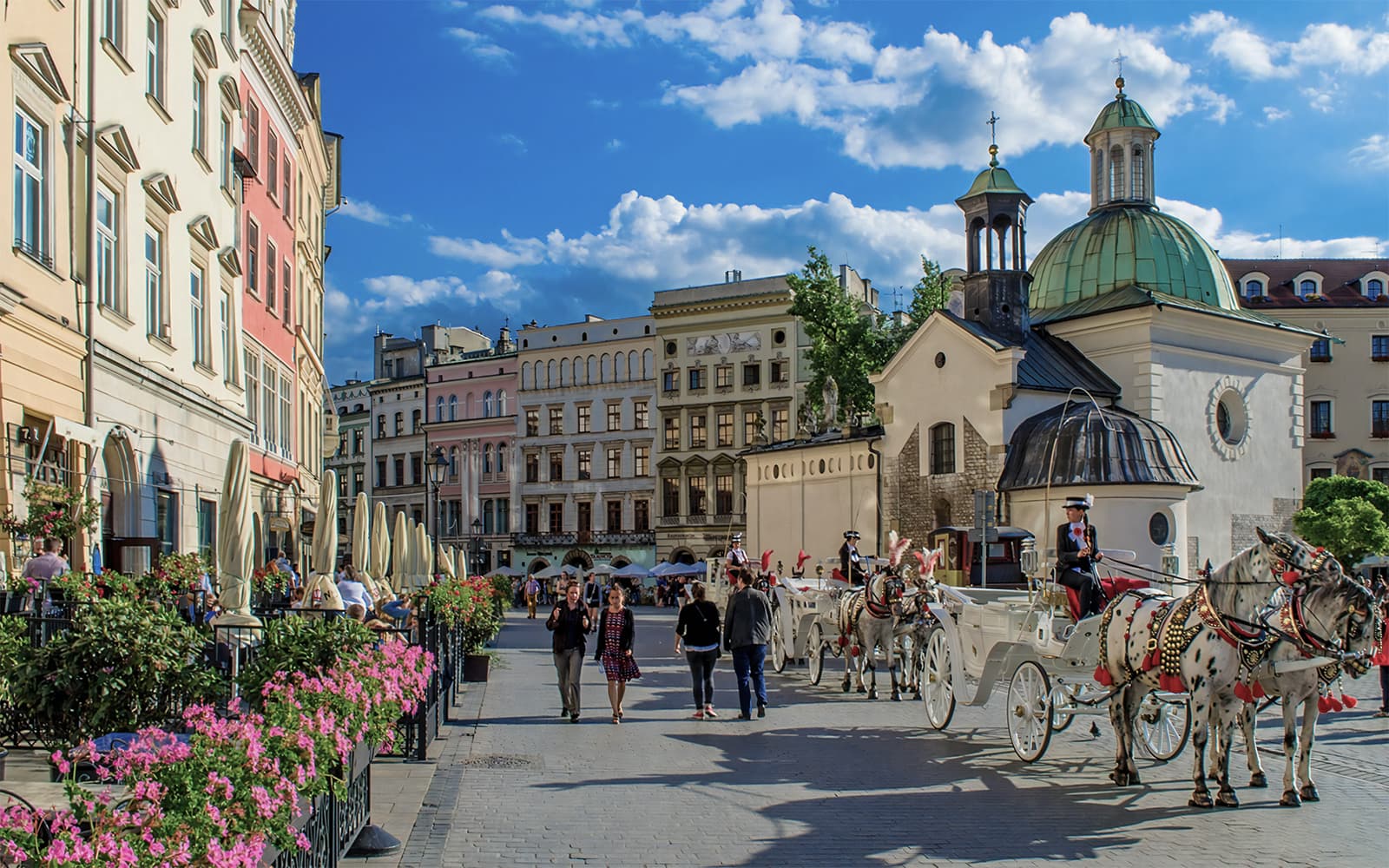 From Warsaw: Krakow, Schindler's Factory & St. Mary's Basilica Small-Group Tour with Lunch