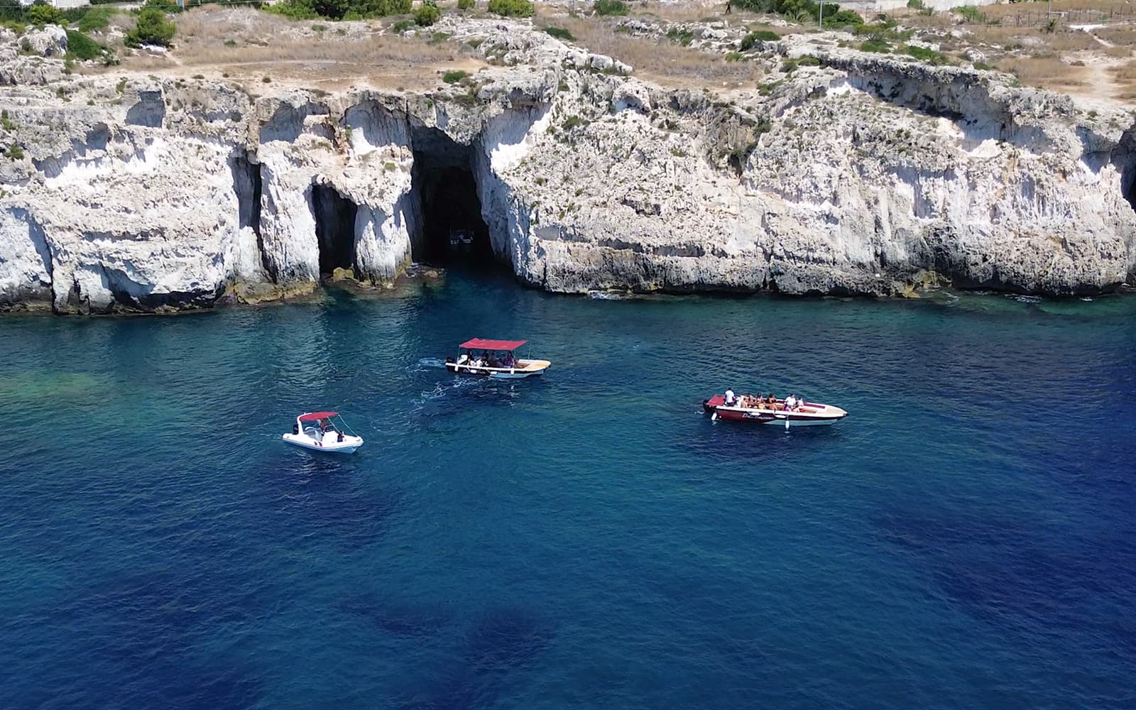 Guided Boat Tour of Ortigia Island with Grotto Visit tickets in Siracusa - Activities | TickYourList