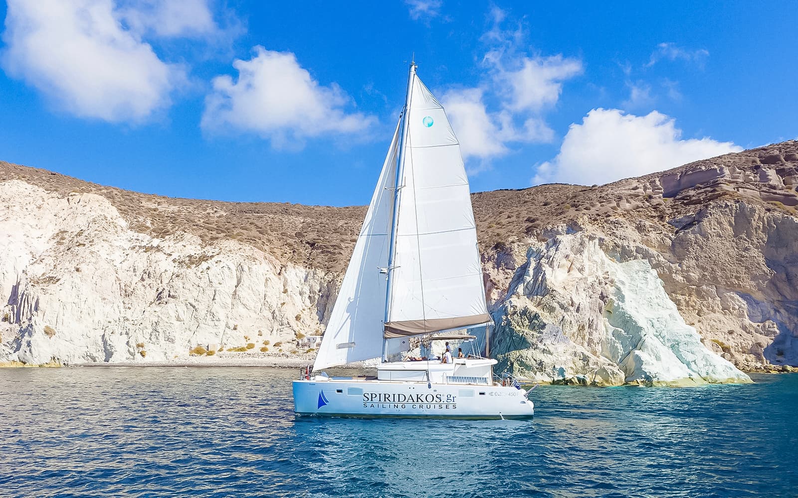 Santorini Private Sailing Catamaran Cruise with BBQ, Drinks & Transfers
