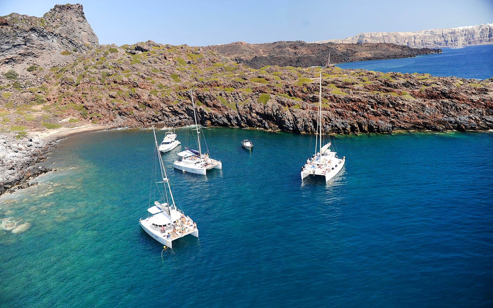 Santorini Private Sailing Catamaran Cruise with BBQ, Drinks & Transfers tickets in Santorini - Attractions | TickYourList