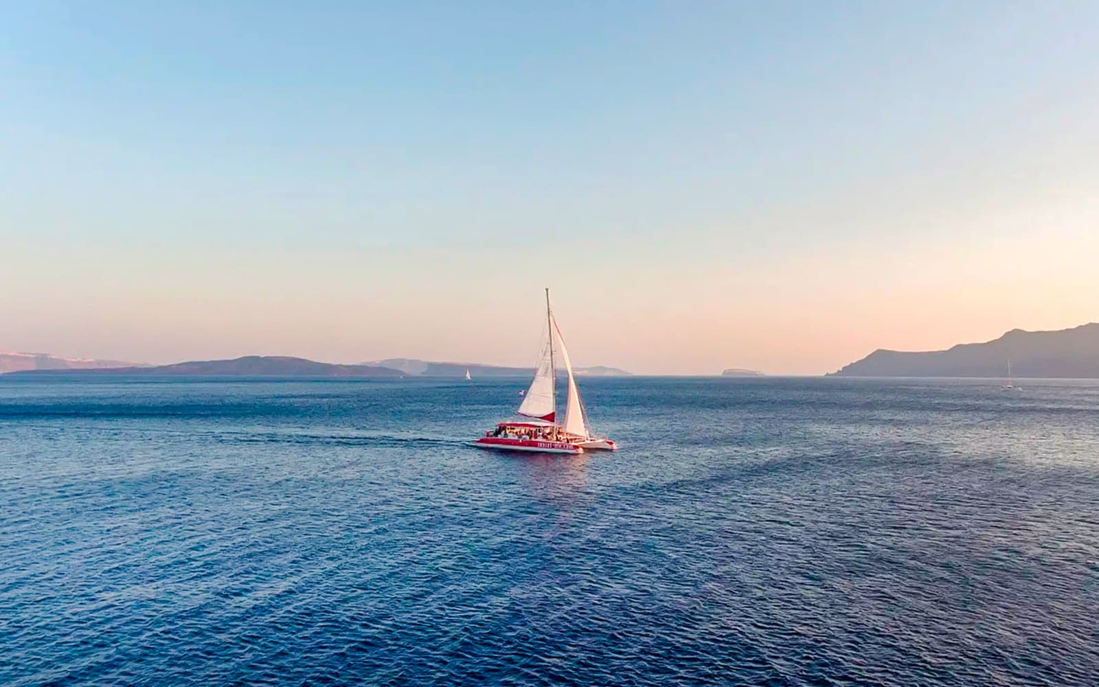 Santorini Catamaran Cruise with Greek BBQ & Drinks