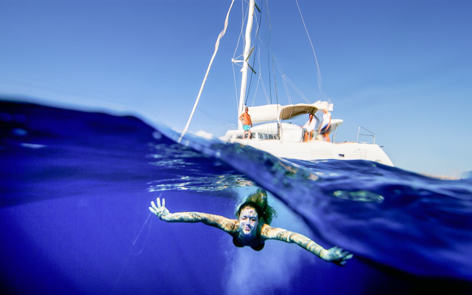 Semi-Private Luxury Catamaran Cruise with Greek Lunch & Transfers tickets in Santorini - Activities | TickYourList