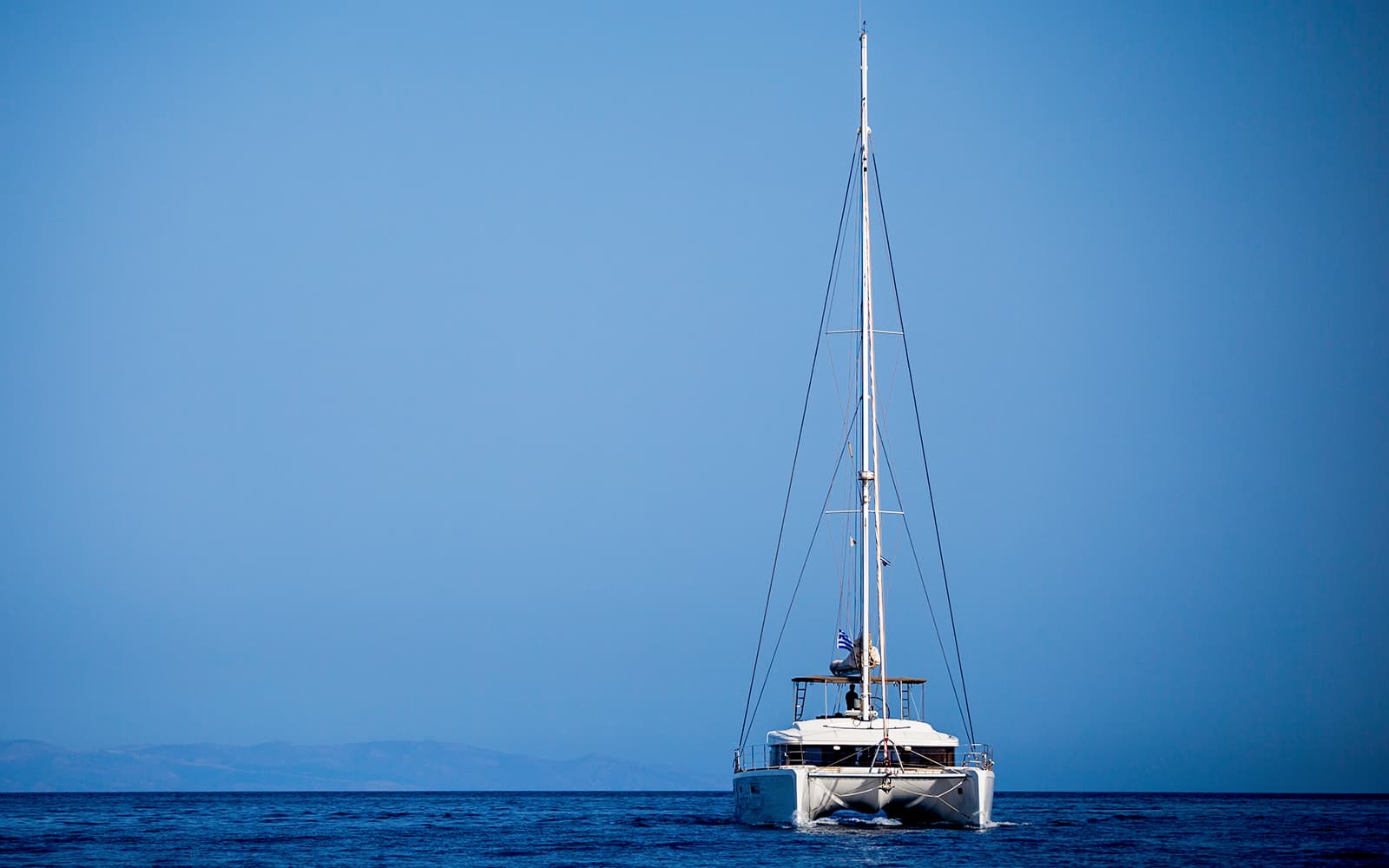 Semi-Private Luxury Catamaran Cruise with Greek Lunch & Transfers tickets in Santorini - Features | TickYourList