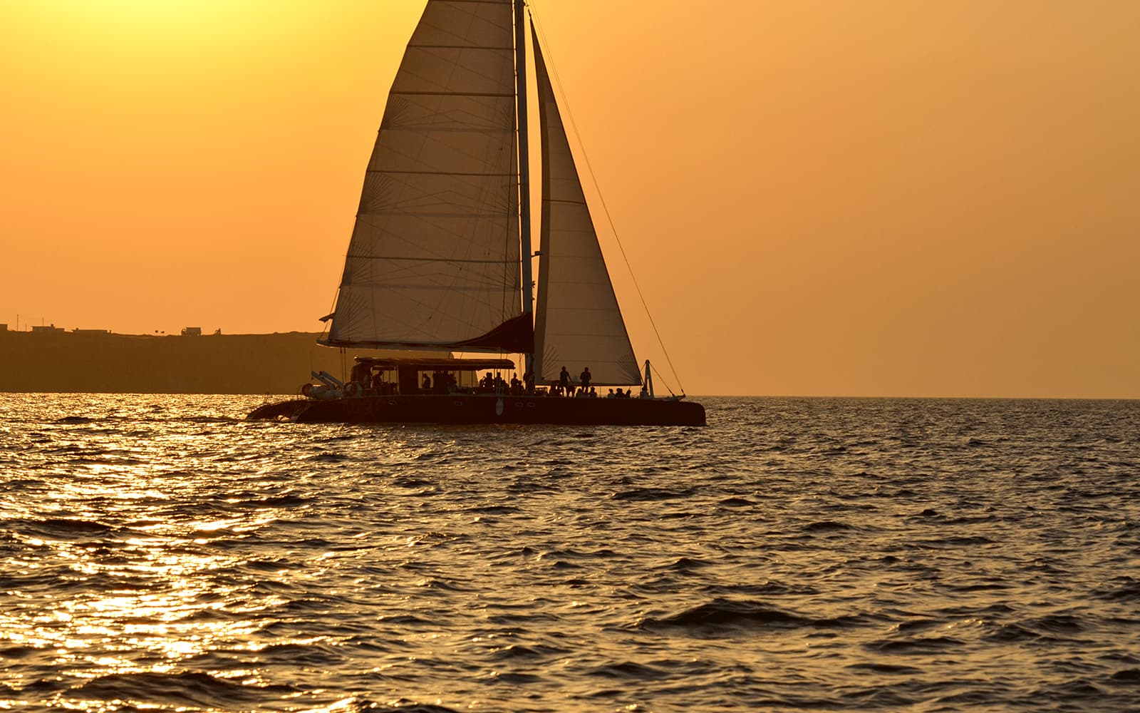 Catamaran Cruise in Santorini with BBQ, Drinks & Transfers