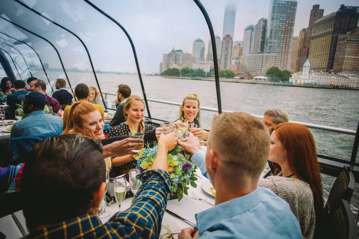 Friends enjoying a dinner cruise in New York City