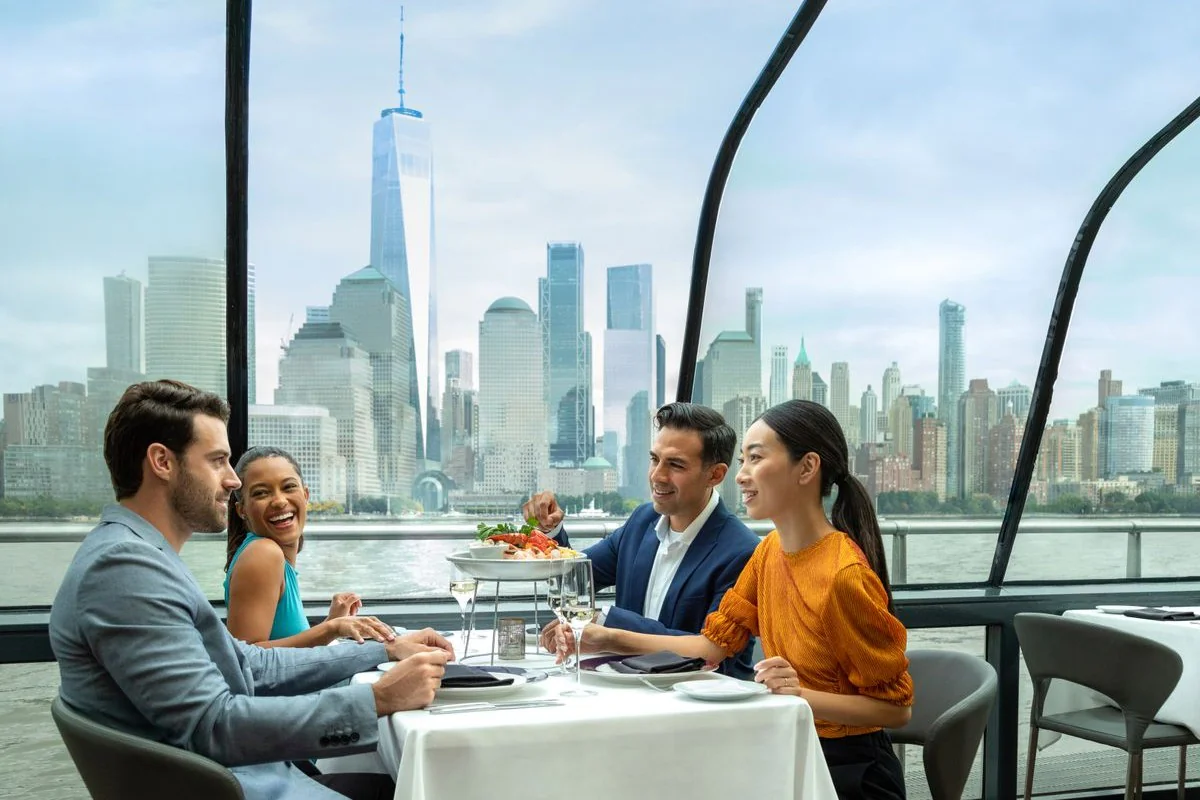 Diverse diners enjoying a brunch cruise in NYC