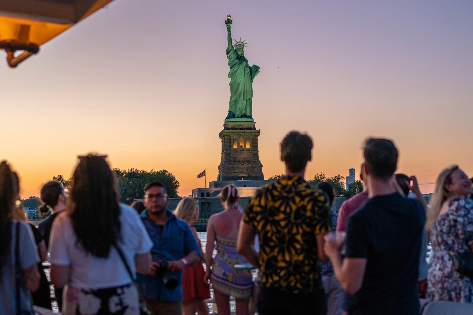 Statue of Liberty at sunset during New York cruise