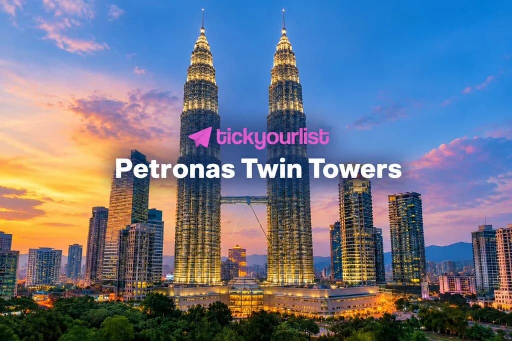 Petronas Twin Towers in Kuala Lumpur illuminated at sunset