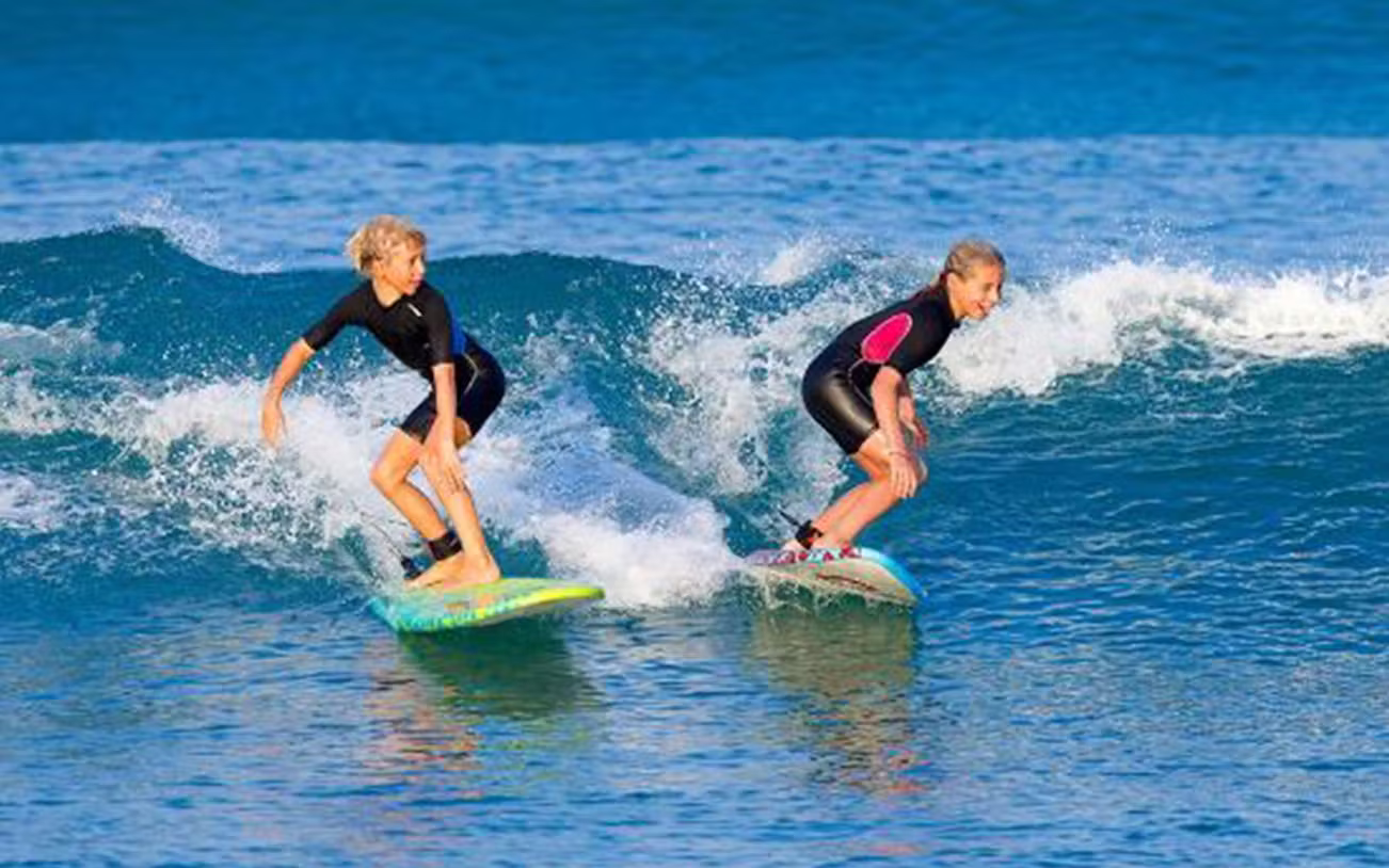 Surfing-6d47fbd7-a71c-4e40-9b32-a68160842ccb-12925-bali-bali-surf-classes---learn-to-ride-the-waves-with-experts-04.avif
